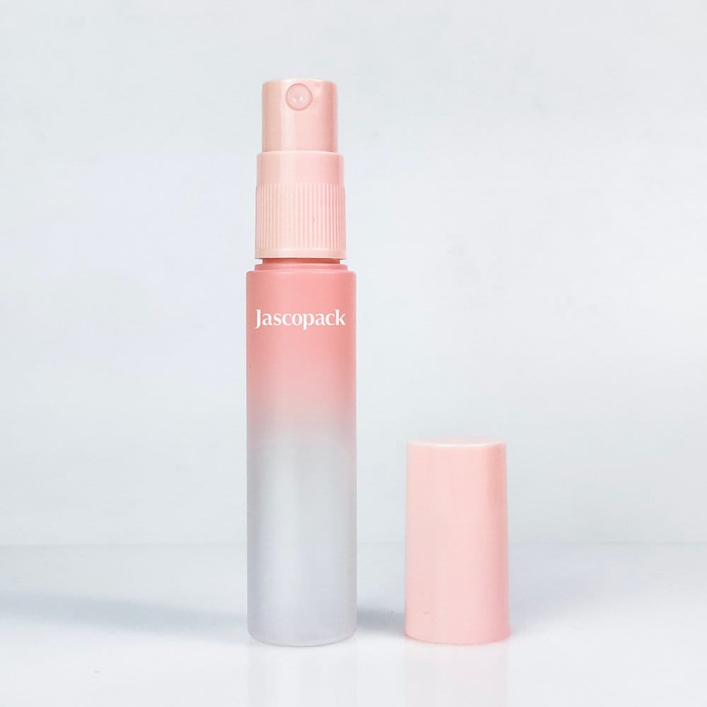Frosted and clear spray bottles